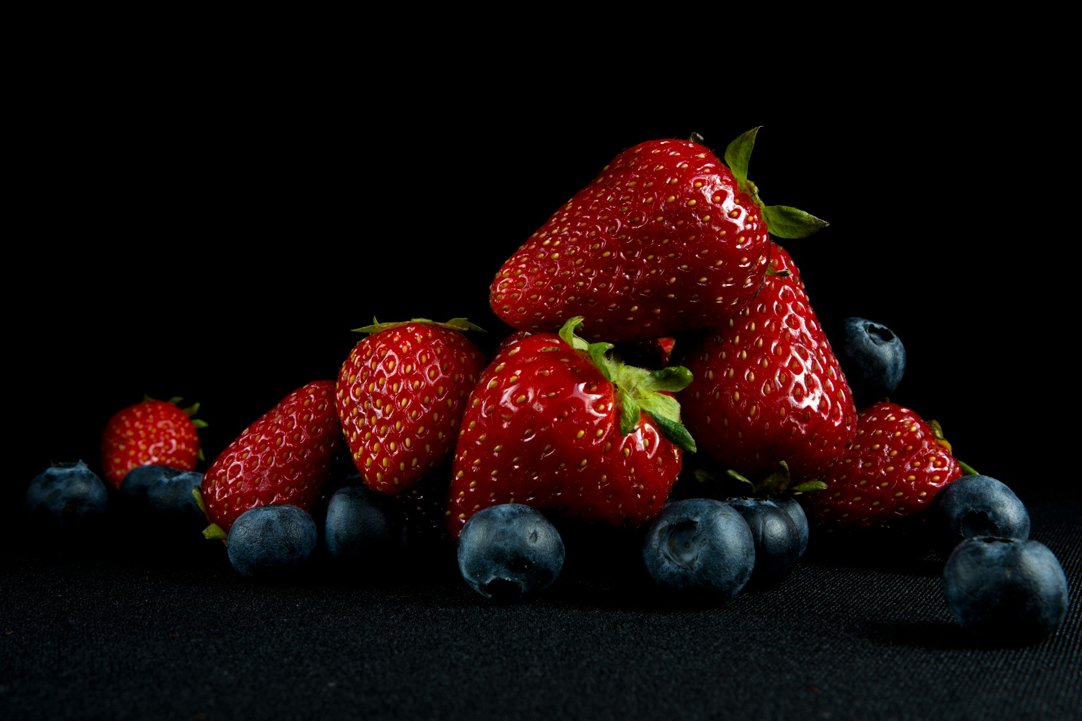 Fresh strawberries, raspberries, and blueberries